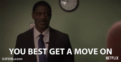 Man In Suit And Tie Says You Best Get A Move On GIF