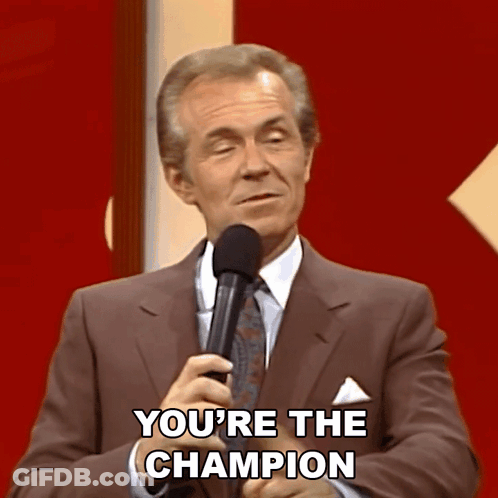 Man In Suit And Tie Says You're Champion GIF