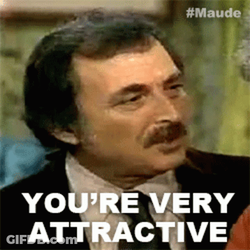 Man In Suit And Tie Says You're Very Attractive GIF