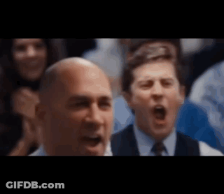 Man In Suit And Tie Screaming In Crowd GIF