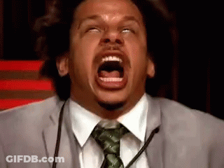 Man In Suit And Tie Screaming Into Microphone GIF