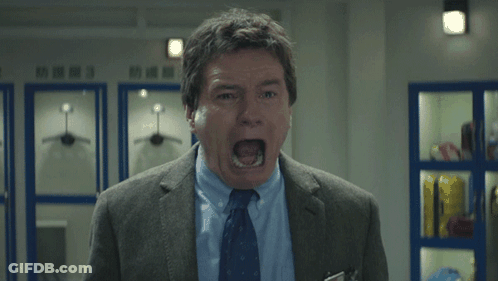 Man In Suit And Tie Screaming GIF