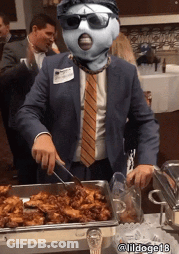 Man In Suit And Tie Serving Food From Buffet Tray @Lildoge18 GIF