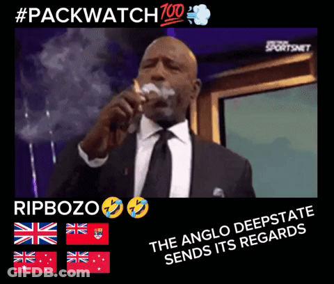 Man In Suit And Tie Singing Into Microphone And Smoking GIF