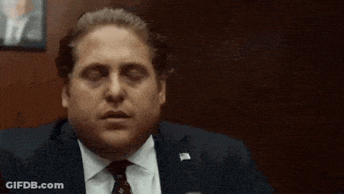 Man In Suit And Tie Singing GIF