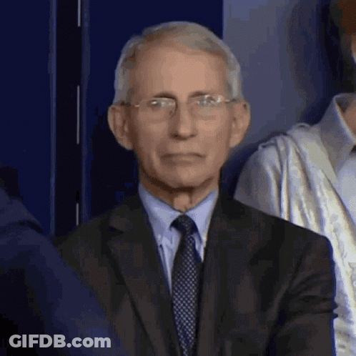 Man In Suit And Tie Sitting GIF