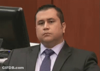 Man In Suit And Tie Sitting At Computer GIF