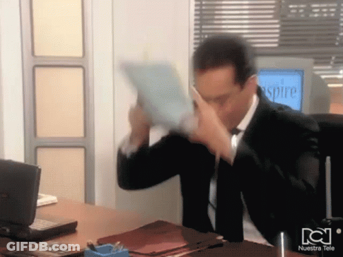 Man In Suit And Tie Sitting At Desk In Front Of Aspire Monitor GIF