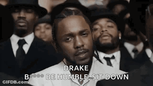 Man In Suit And Tie Sitting GIF