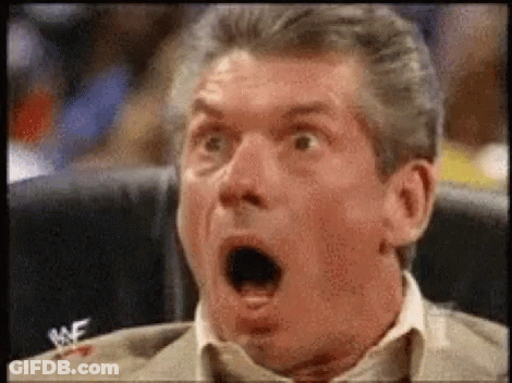 Man In Suit And Tie Sitting With Open Mouth GIF