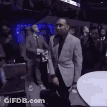 Man In Suit And Tie Smiling GIF