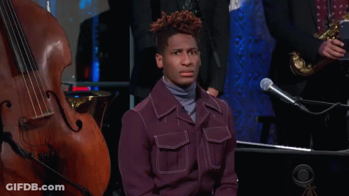 Man In Suit And Tie Smiling GIF