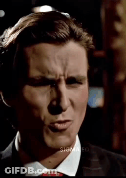 Man In Suit And Tie Smiling GIF