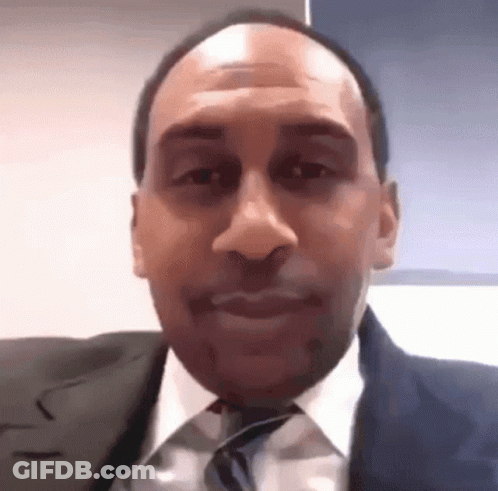 Man In Suit And Tie Smiling GIF