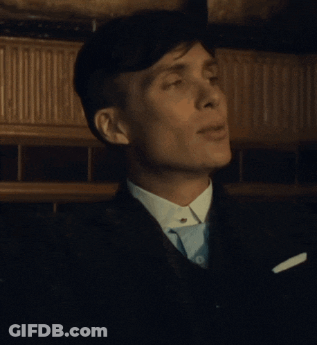 Man In Suit And Tie Smiling GIF