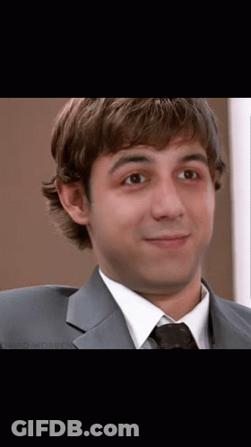 Man In Suit And Tie Smiling GIF