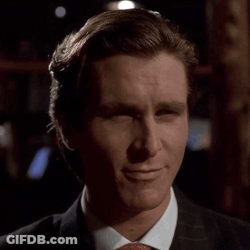 Man In Suit And Tie Smiling GIF