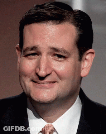 Man In Suit And Tie Smiling At Camera GIF