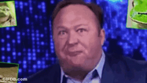 Man In Suit And Tie Smiling At Screen With Frogs GIF