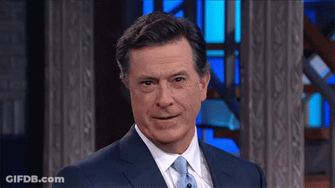 Man In Suit And Tie Smiling Blue Background GIF