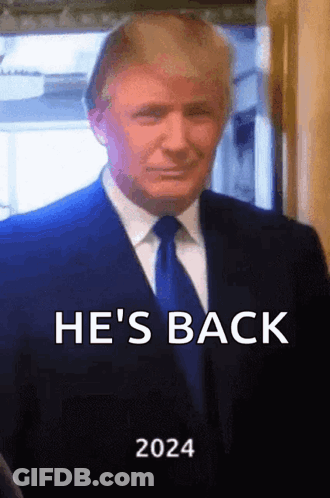 Man In Suit And Tie Smiling He's Back 2024 GIF