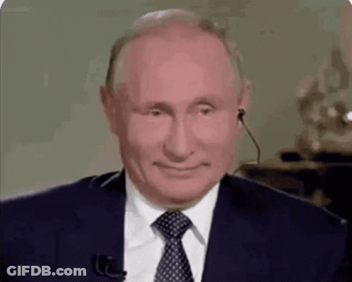 Man In Suit And Tie Smiling GIF