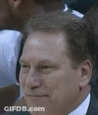 Man In Suit And Tie Smiling In Crowd GIF