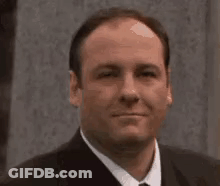Man In Suit And Tie Smiling GIF