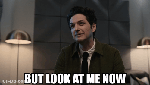 Man In Suit And Tie Smiling GIF