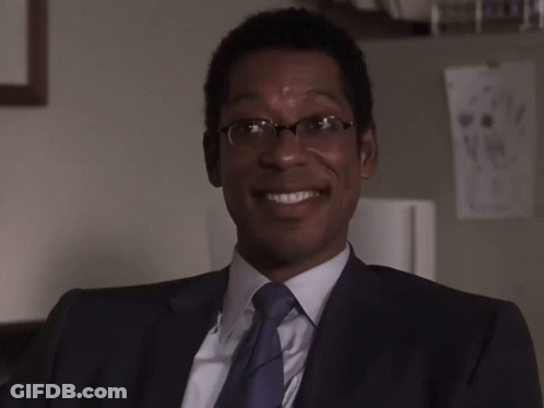 Man In Suit And Tie Smiling GIF