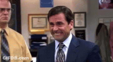 Man In Suit And Tie Smiling Next To Another Man GIF