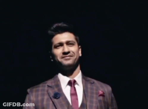 Man In Suit And Tie Smiling GIF