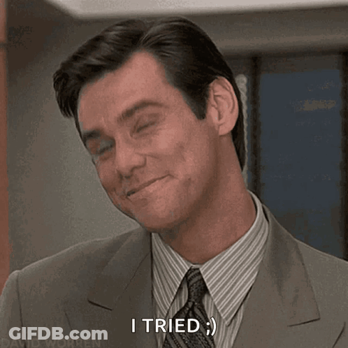 Man In Suit And Tie Smiling Saying I Tried GIF