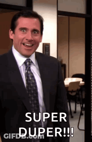 Man In Suit And Tie Smiling Saying Super Duper GIF