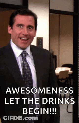 Man In Suit And Tie Smiling Says Awesomeness Let The Drinks Begin!!! GIF