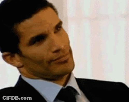 Man In Suit And Tie Smiling GIF