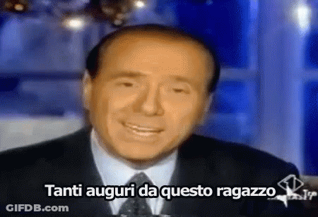 Man In Suit And Tie Smiling Tanti Auguri Da Questo Ragazzo GIF