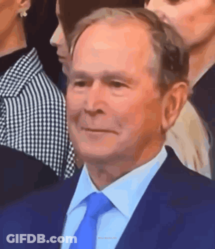 Man In Suit And Tie Smiling GIF