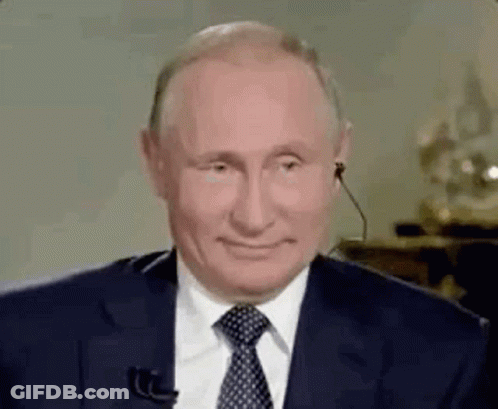 Man In Suit And Tie Smiling GIF