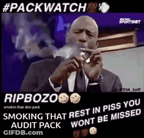 Man In Suit And Tie Smoking Cigarette GIF