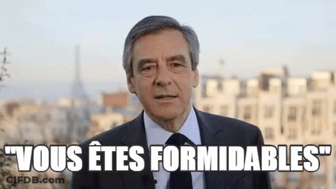 Man In Suit And Tie Speaking Before City GIF