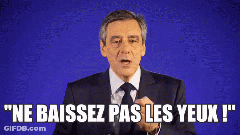 Man In Suit And Tie Speaking French GIF