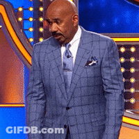 Man In Suit And Tie Standing GIF