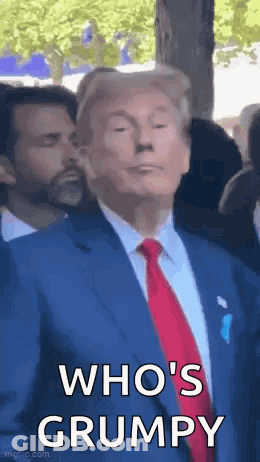 Man In Suit And Tie Standing GIF