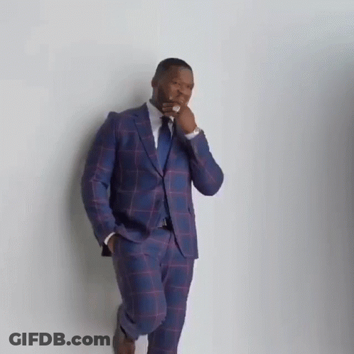 Man In Suit And Tie Standing GIF