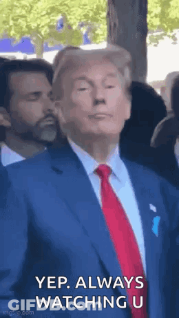 Man In Suit And Tie Standing Before Crowd GIF