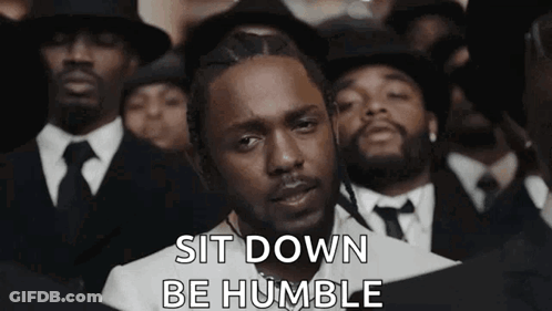 Man In Suit And Tie Standing Before Crowd GIF