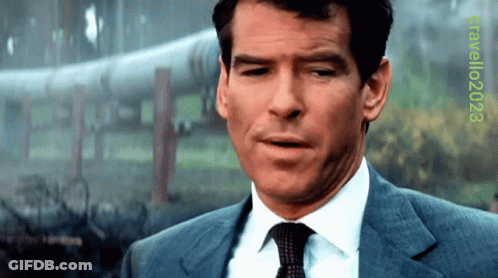 Man In Suit And Tie Standing By Pipe 2028 GIF