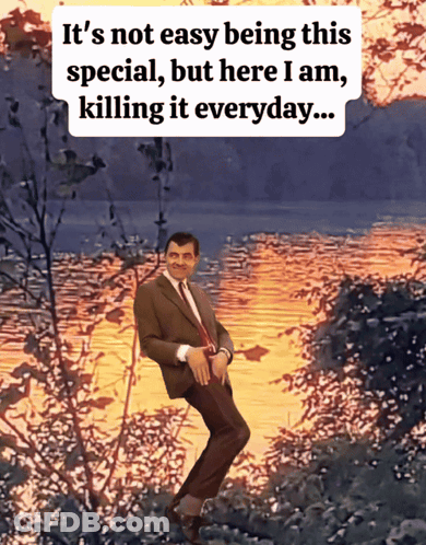 Man In Suit And Tie Standing By Water GIF