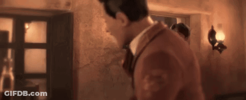 Man In Suit And Tie Standing GIF
